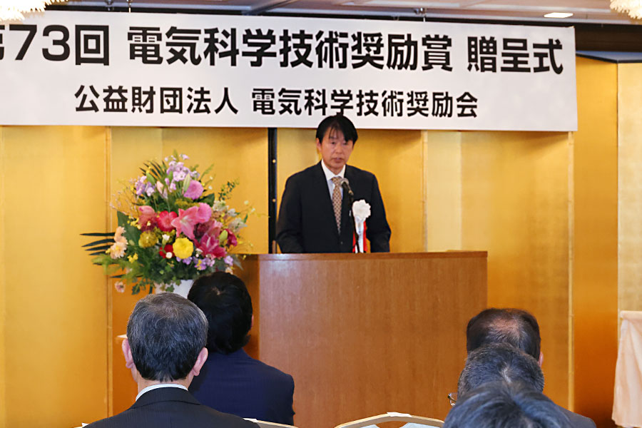 文部科学省研究振興局長祝辞（代読・杉山祐士 文部科学省研究振興局 振興企画課 奨励室長）