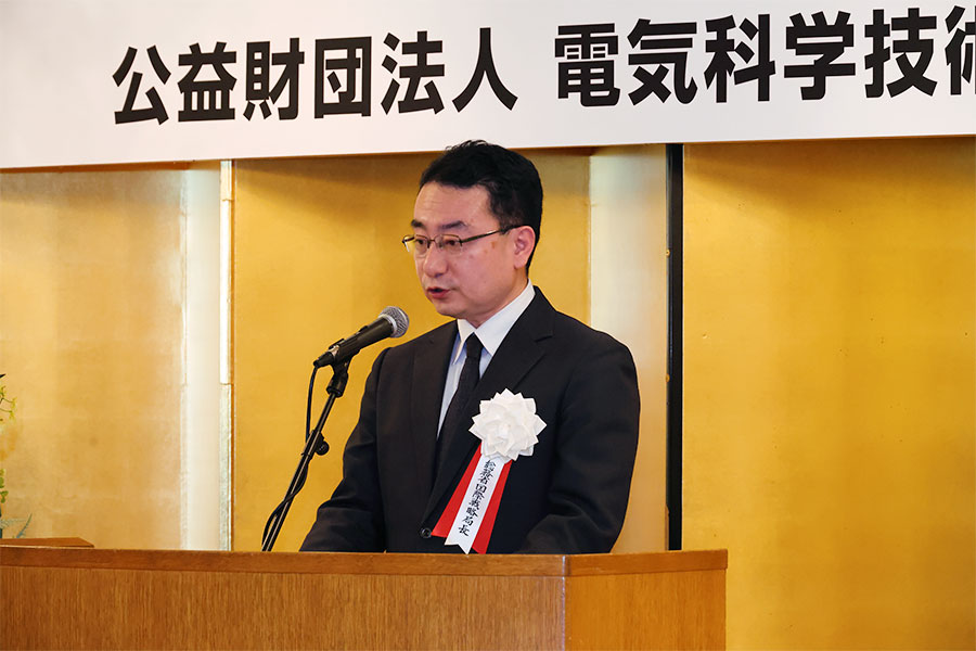 総務省国際戦略局長祝辞（代読・寺岡秀礼 総務省国際戦略局 技術政策課長）